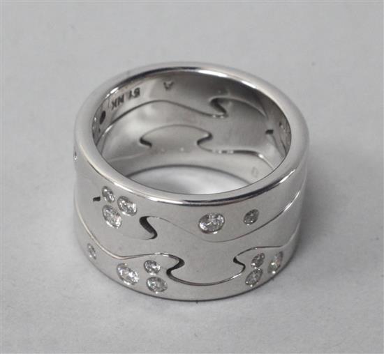 A modern Georg Jensen 18ct white gold and diamond set fusion ring, with Georg Jensen box, size L/M